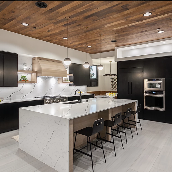 matching kitchen island with the countertop and backsplash