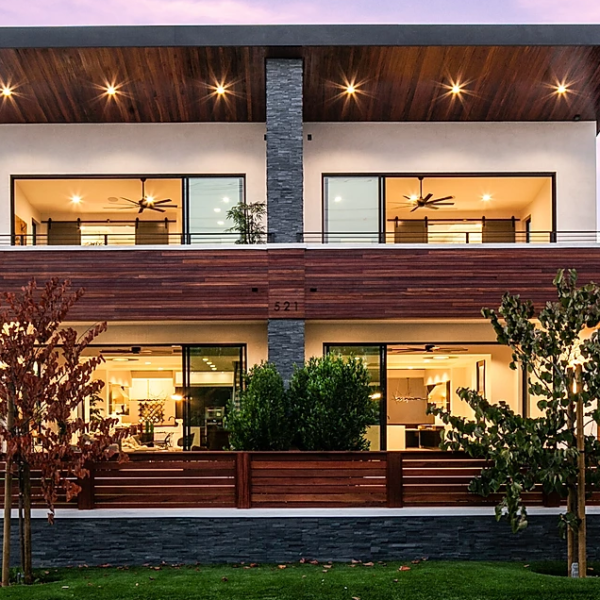 Modern home exterior with porcelain tile facade and large windows