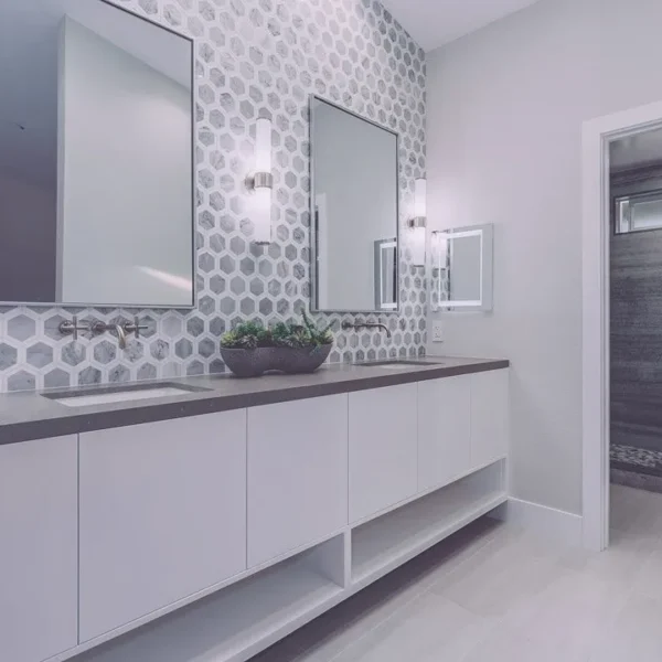 Minimalist bathroom design with mosaic bacsplashes.