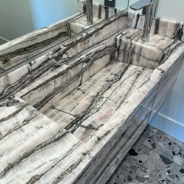 gorgeous marble slab turned into an aesthetic integrated sink.
